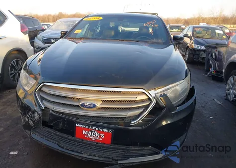 2014 Ford Taurus from USA, damaged, VIN 1EAHP2E93EG109638